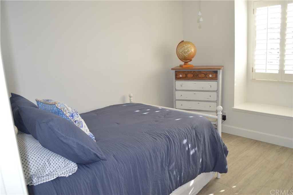 2139 Via Aguila San Clemente, CA 92673 - Photo 16 of 34 a bedroom with a bed and window