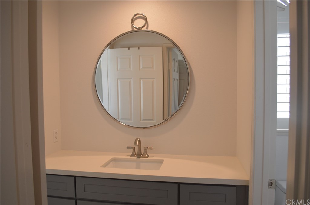2139 Via Aguila San Clemente, CA 92673 - Photo 18 of 34 a bathroom with a sink and a mirror