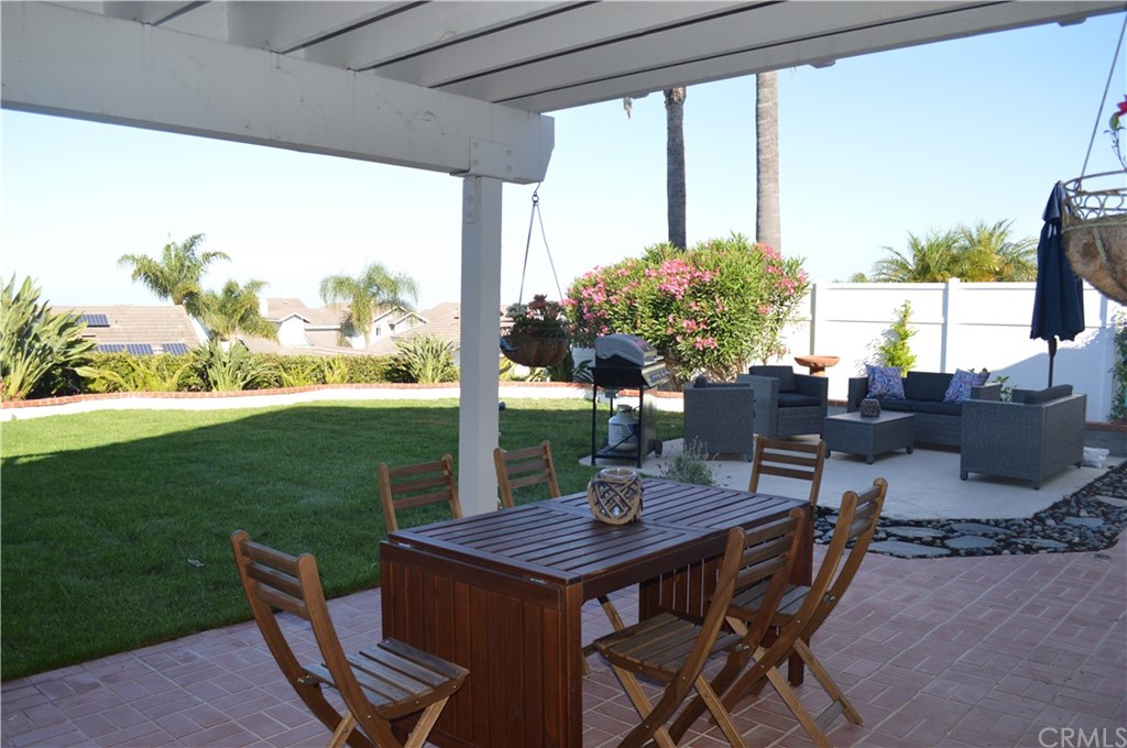 2139 Via Aguila San Clemente, CA 92673 - Photo 32 of 34 a view of an outdoor dining space with a table and chairs