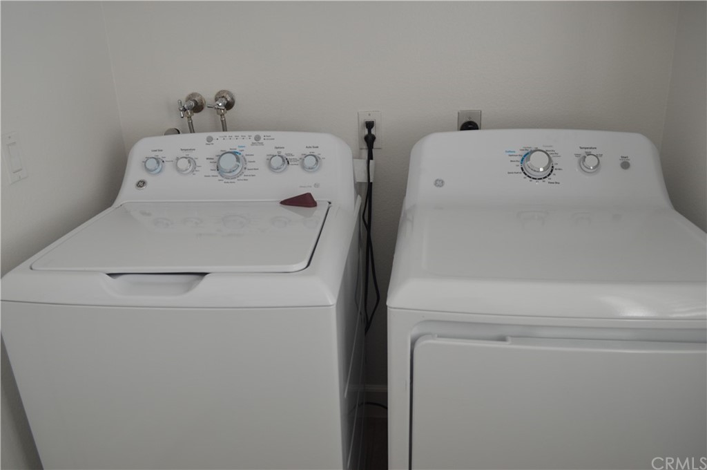 2139 Via Aguila San Clemente, CA 92673 - Photo 34 of 34 a utility room with dryer and washer