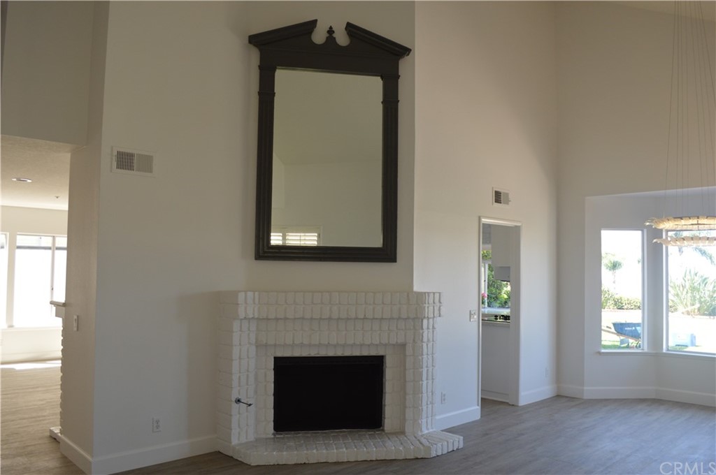 2139 Via Aguila San Clemente, CA 92673 - Photo 5 of 34 a view of an empty room with wooden floor and a window