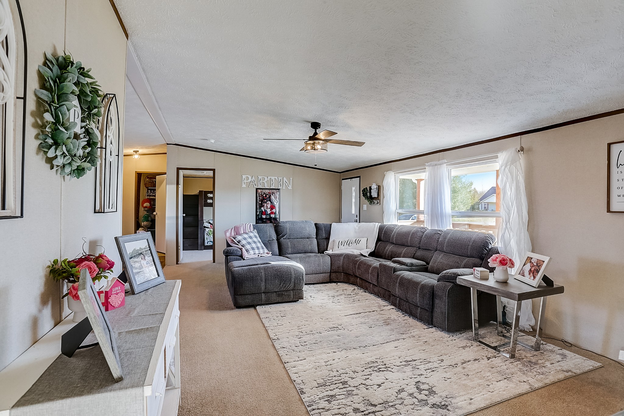 4249 Red Boiling Springs Road Lafayette, TN 37083 - Photo 4 of 16 a living room with furniture and flowers