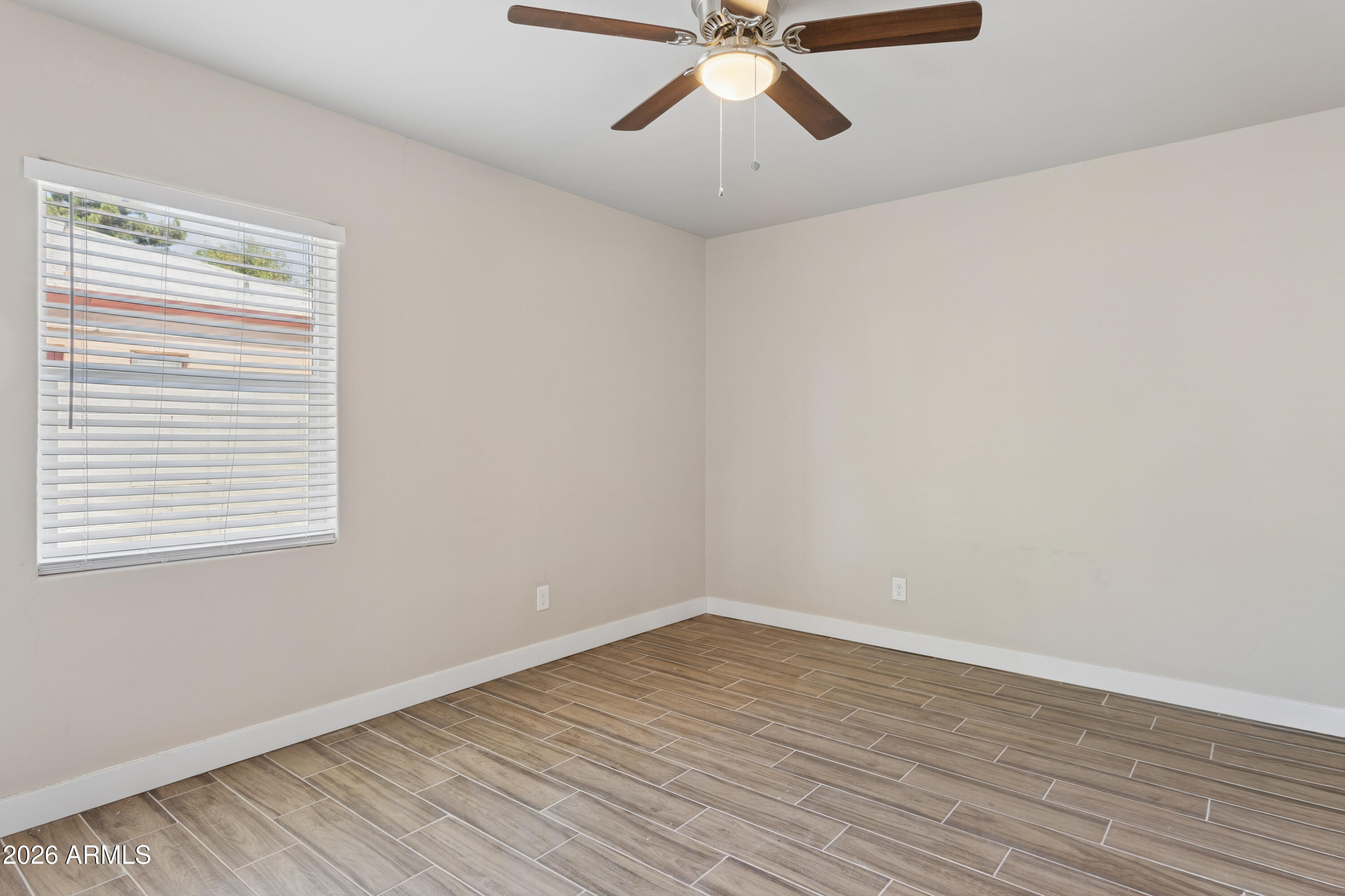 322 West Coronado Road Phoenix, AZ 85003 - Photo 26 of 93 wooden floor in an empty room with a window