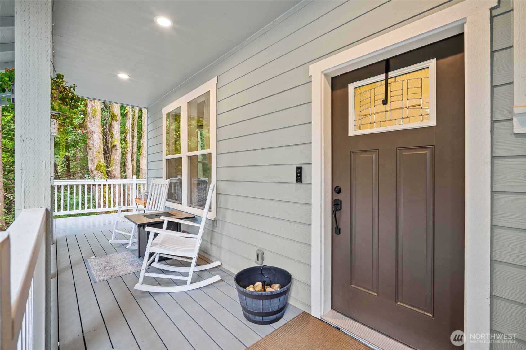 23 Spring Court Bellingham, WA 98229 - Photo 2 of 38 a balcony view with a seating space
