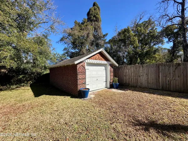 a view of backyard of house