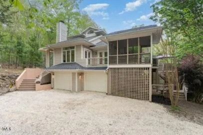 a front view of a house with a garage