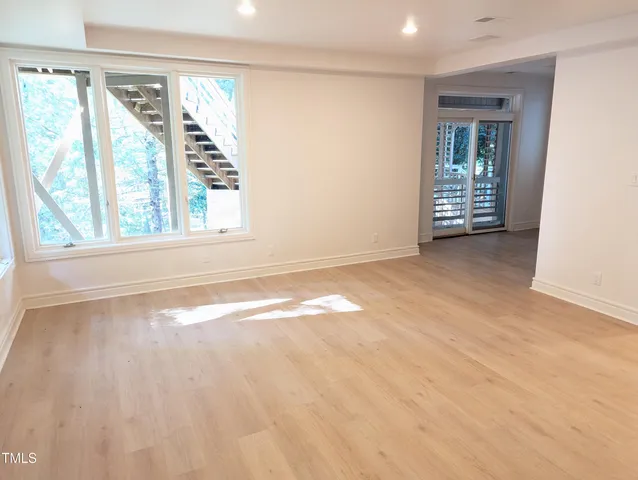 an empty room with windows