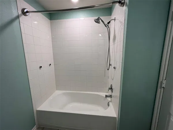 a bathroom with a bathtub