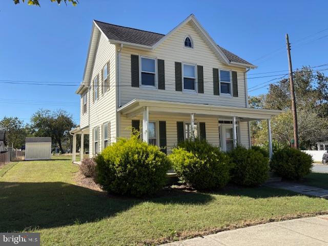 301 Central Avenue Ridgely, MD 21660 - Photo 1 of 20 a front view of a house with garden