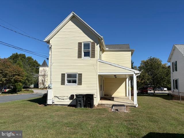 301 Central Avenue Ridgely, MD 21660 - Photo 15 of 20 a front view of a house with a yard