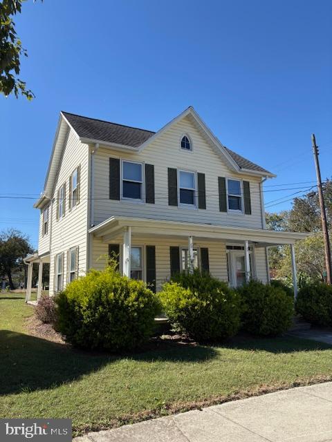 301 Central Avenue Ridgely, MD 21660 - Photo 2 of 20 a front view of a house with garden