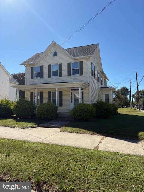 301 Central Avenue Ridgely, MD 21660 - Photo 3 of 20 a front view of a house with a yard