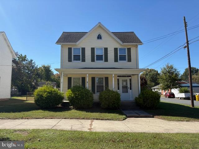 301 Central Avenue Ridgely, MD 21660 - Photo 5 of 20 a front view of a house with garden