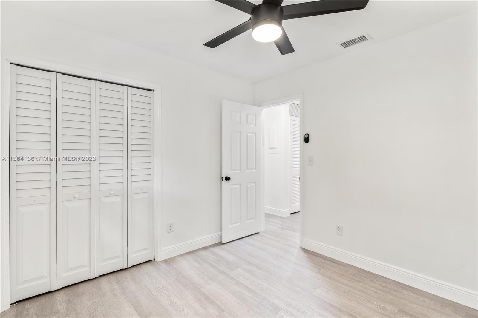 7321 Northwest 11th Place Plantation, FL 33313 - Photo 17 of 23 wooden floor in an empty room