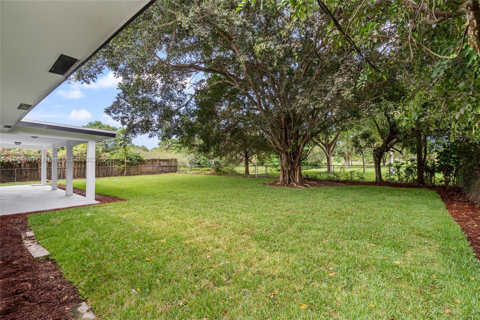 7321 Northwest 11th Place Plantation, FL 33313 - Photo 21 of 23 a view of yard with tree s