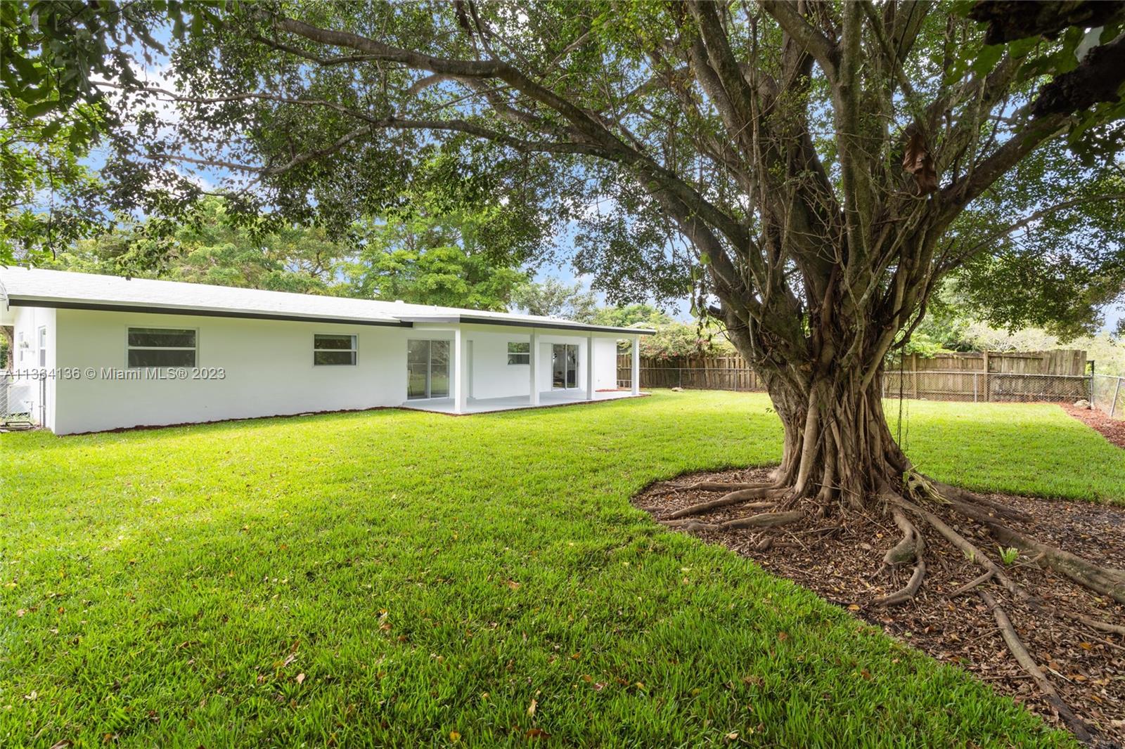7321 Northwest 11th Place Plantation, FL 33313 - Photo 22 of 23 a house view with a garden space