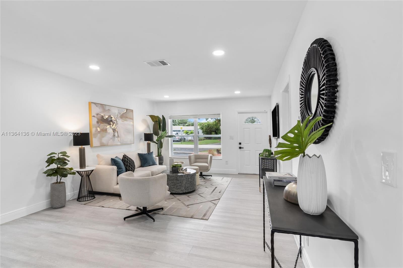 7321 Northwest 11th Place Plantation, FL 33313 - Photo 5 of 23 a living room with furniture