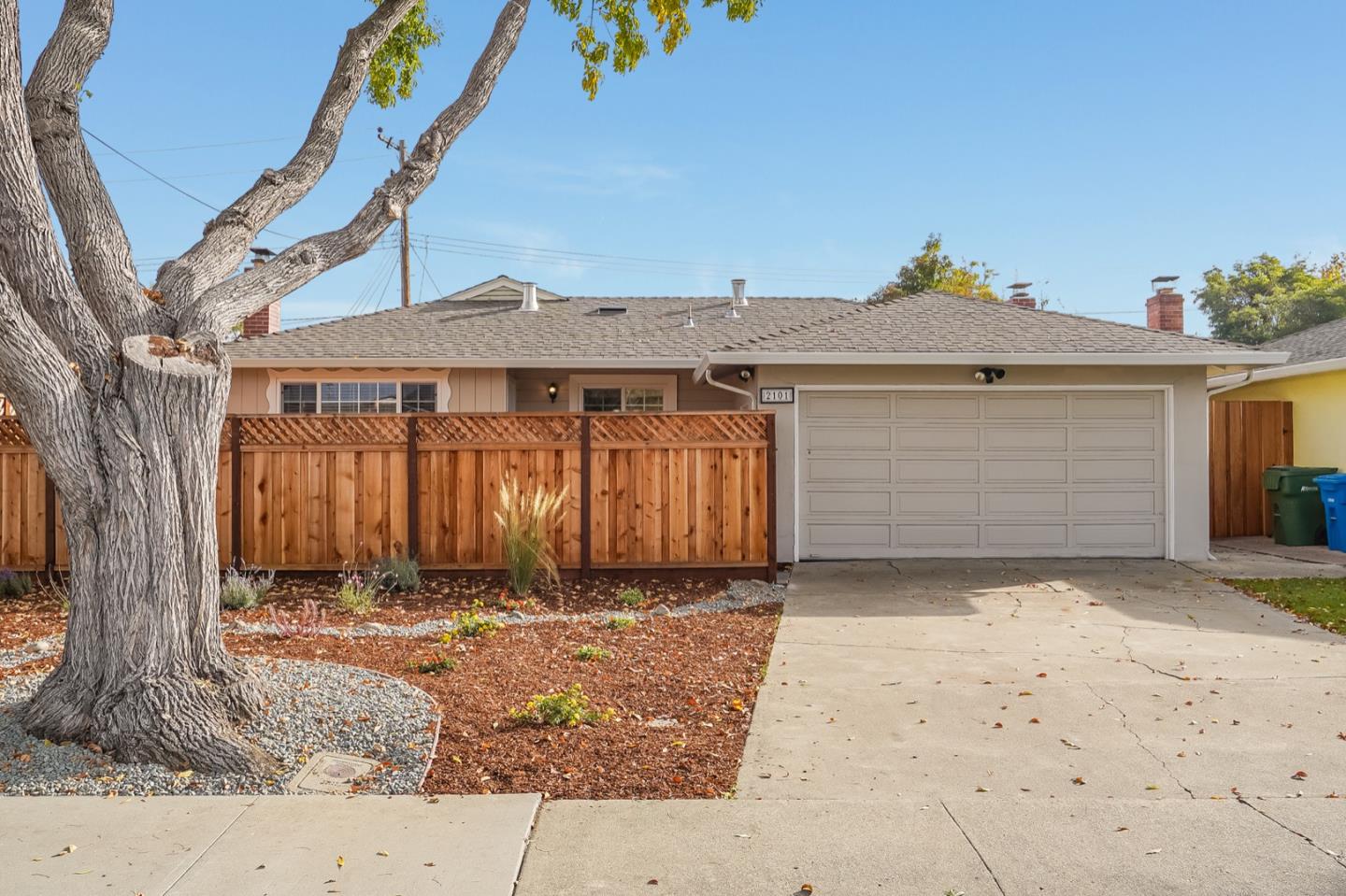 2101 Briarwood Drive Santa Clara, CA 95051 - Photo 1 of 41 a front view of a house with a yard