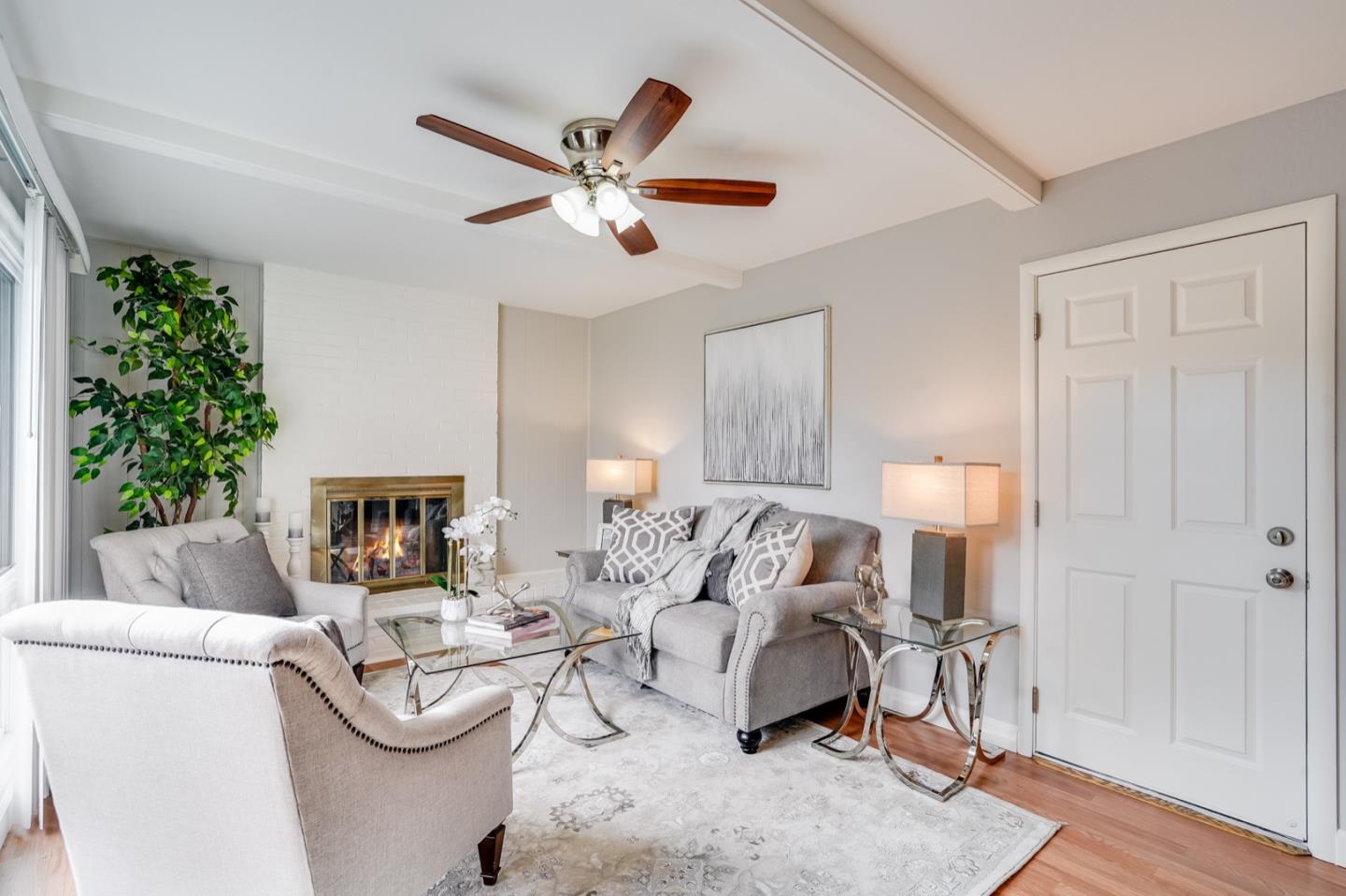 2101 Briarwood Drive Santa Clara, CA 95051 - Photo 11 of 41 a living room with furniture and a potted plant