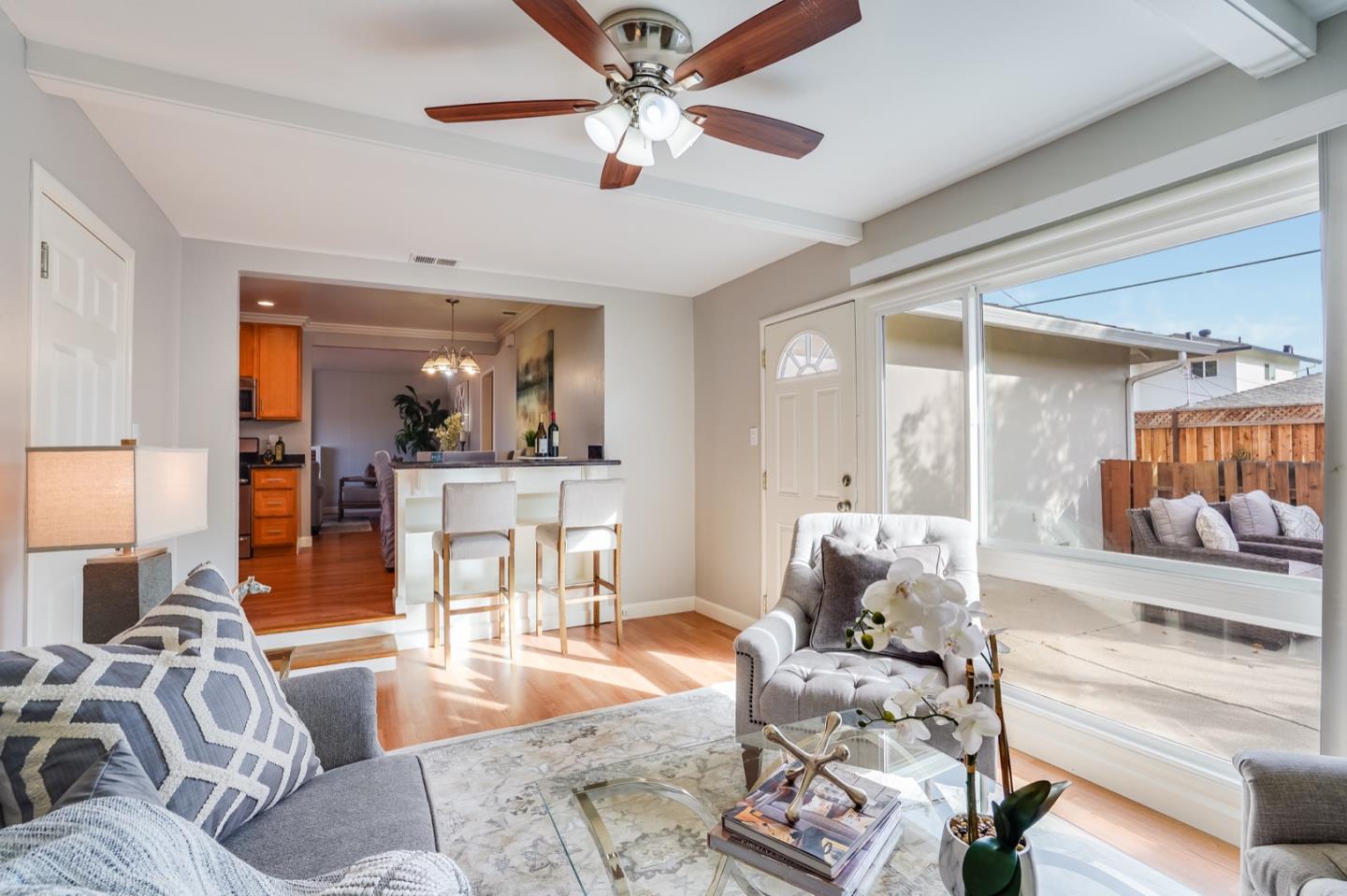 2101 Briarwood Drive Santa Clara, CA 95051 - Photo 13 of 41 a living room with furniture and a large window