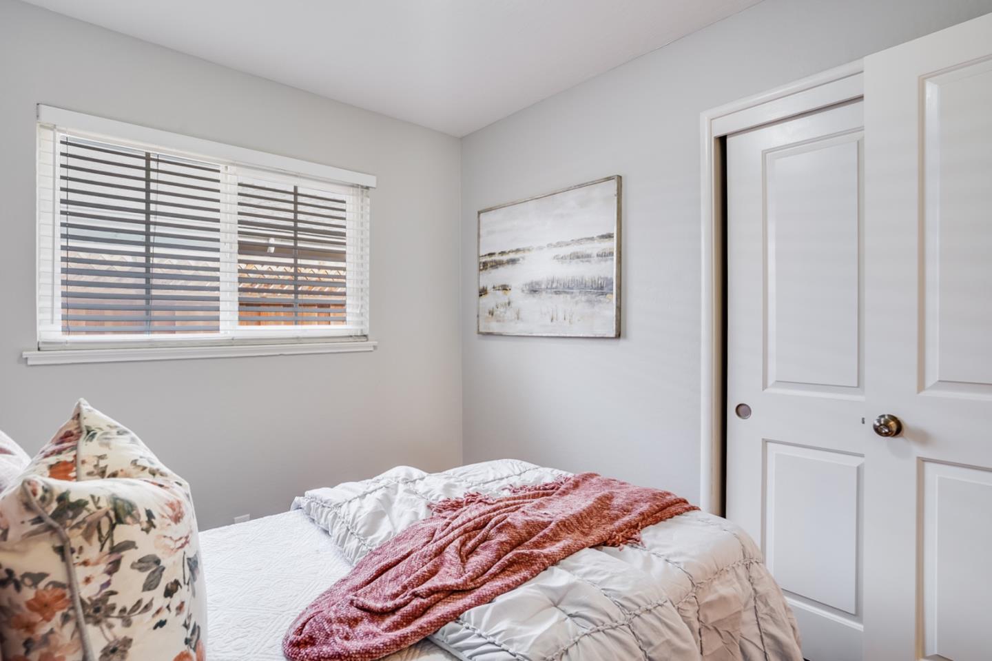2101 Briarwood Drive Santa Clara, CA 95051 - Photo 17 of 41 a bedroom with a bed and a window