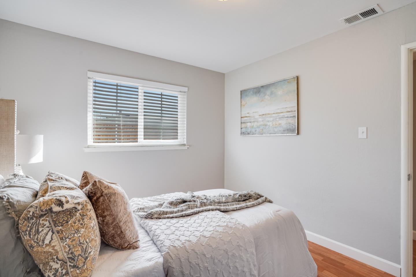2101 Briarwood Drive Santa Clara, CA 95051 - Photo 19 of 41 a bedroom with a bed and a window