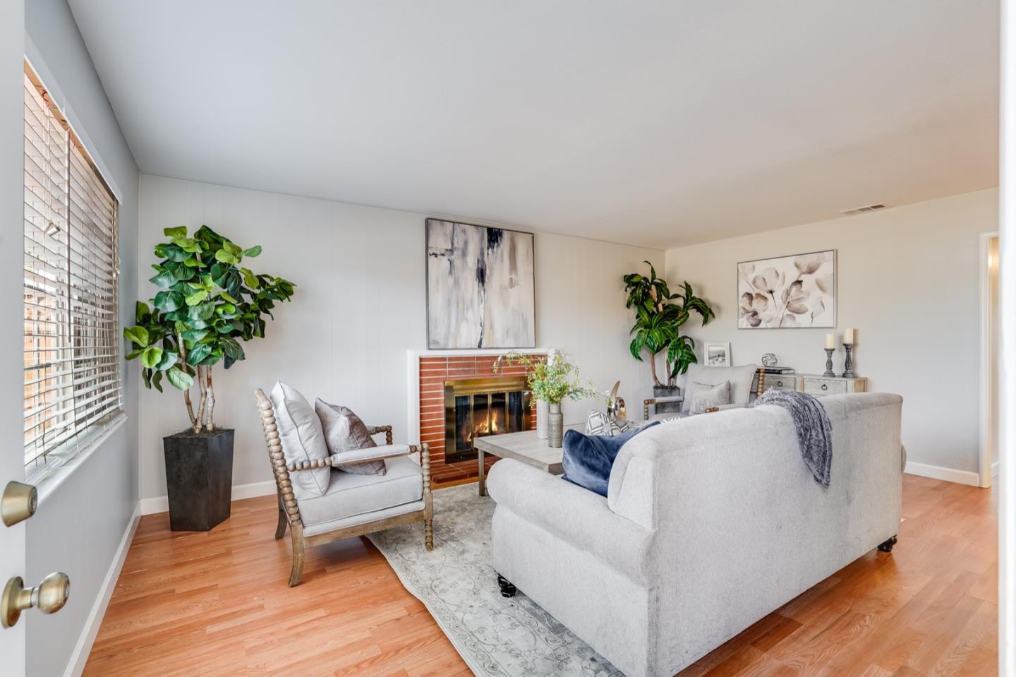 2101 Briarwood Drive Santa Clara, CA 95051 - Photo 3 of 41 a living room with furniture and a potted plant