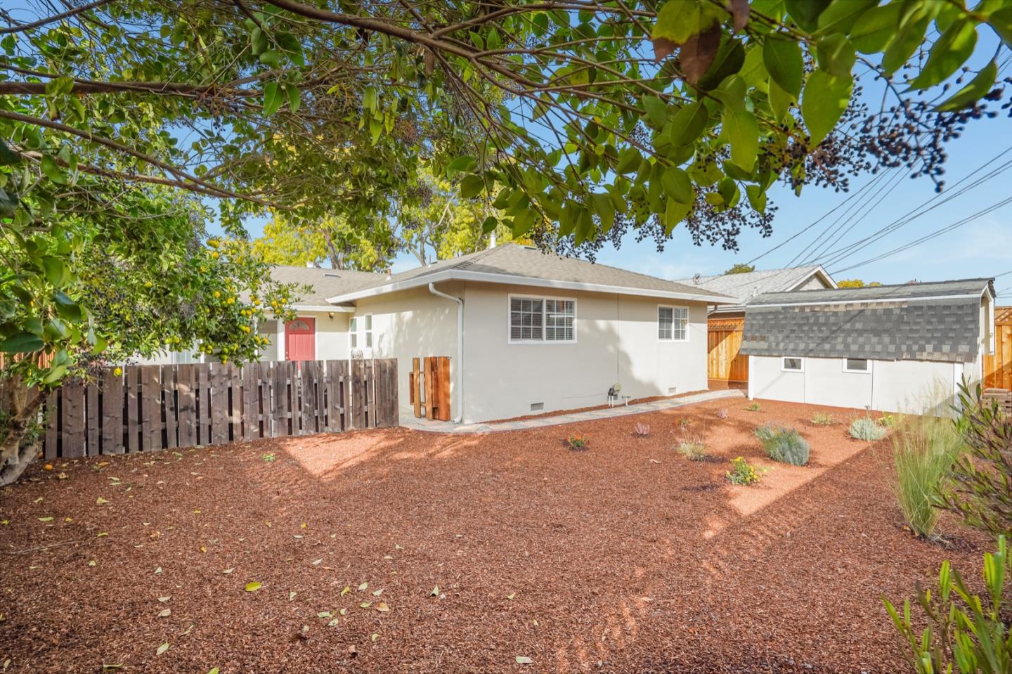 2101 Briarwood Drive Santa Clara, CA 95051 - Photo 30 of 41 a front view of a house with a yard and garage
