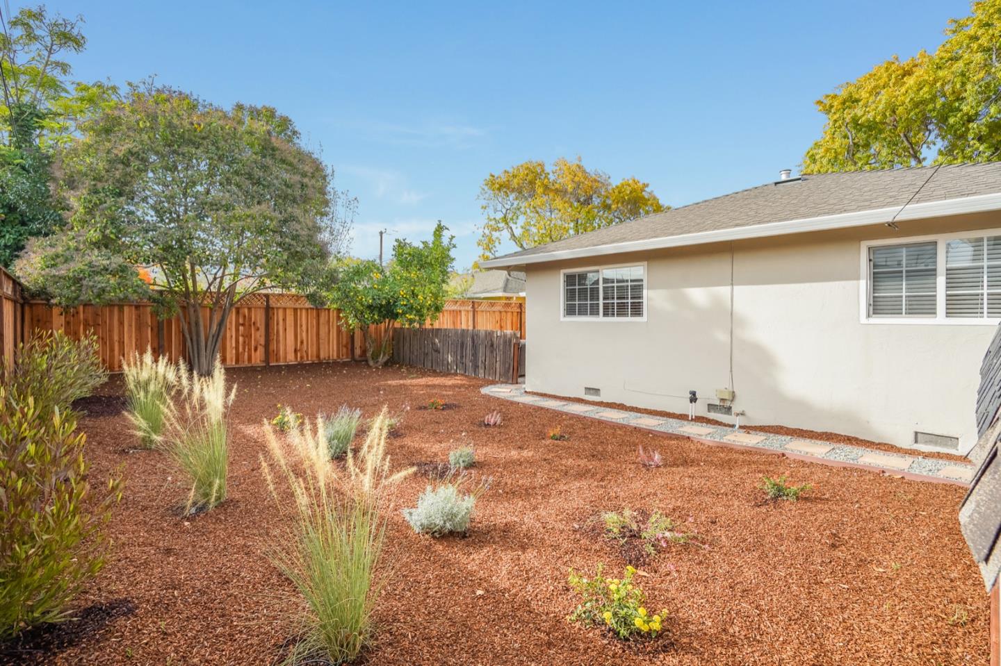 2101 Briarwood Drive Santa Clara, CA 95051 - Photo 32 of 41 a view of a house with a backyard and a tree