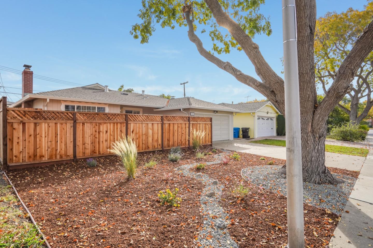 2101 Briarwood Drive Santa Clara, CA 95051 - Photo 35 of 41 a front view of a house with garden