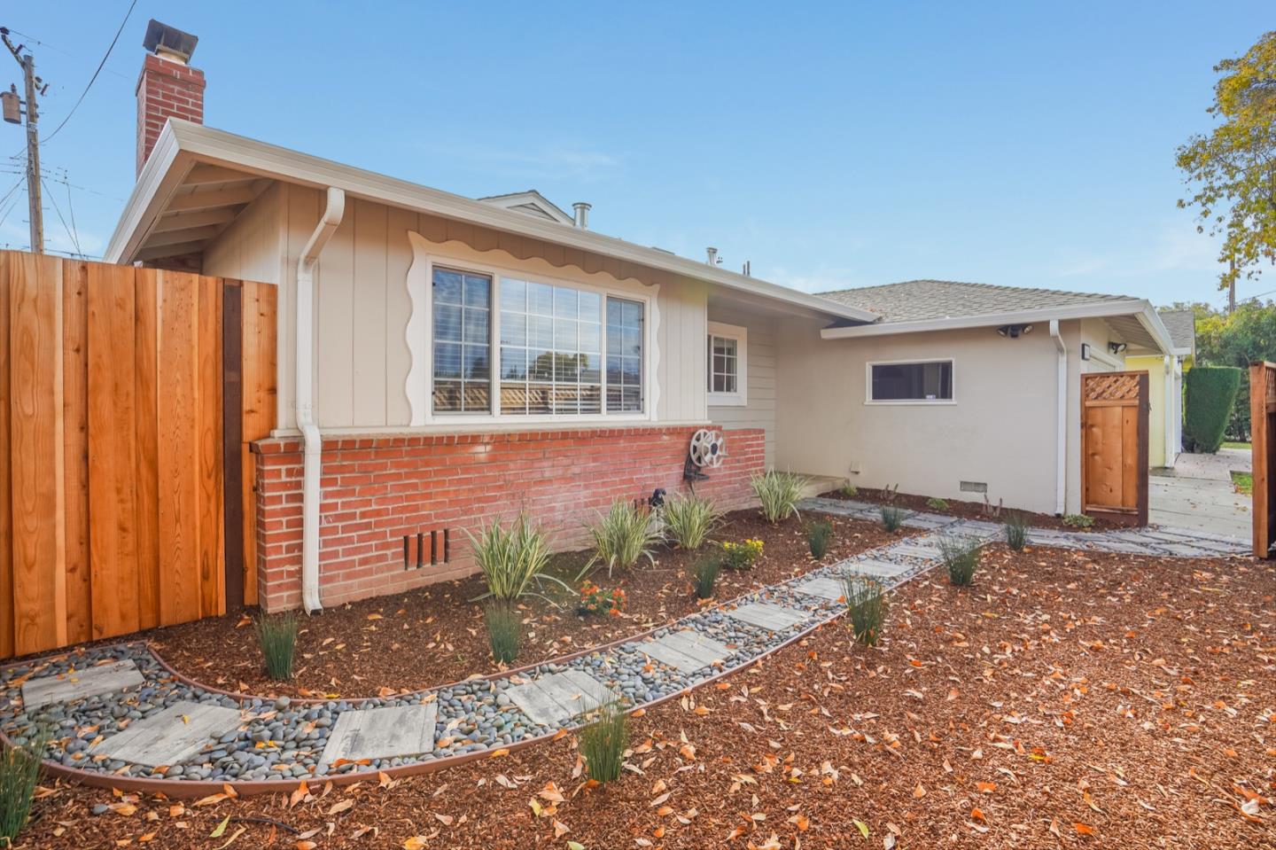 2101 Briarwood Drive Santa Clara, CA 95051 - Photo 37 of 41 a front view of a house with garden
