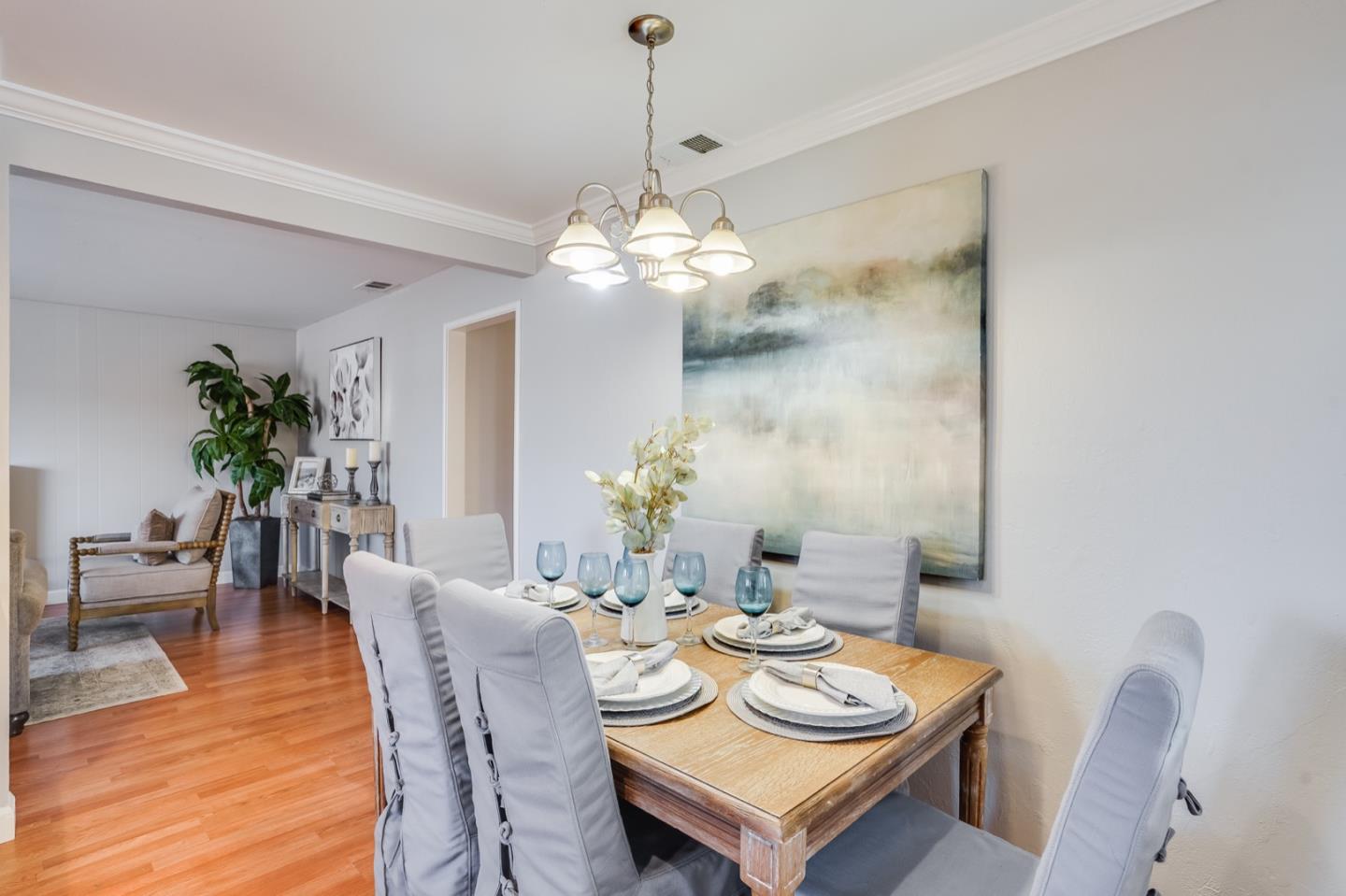 2101 Briarwood Drive Santa Clara, CA 95051 - Photo 9 of 41 a view of a dining room with furniture and wooden floor