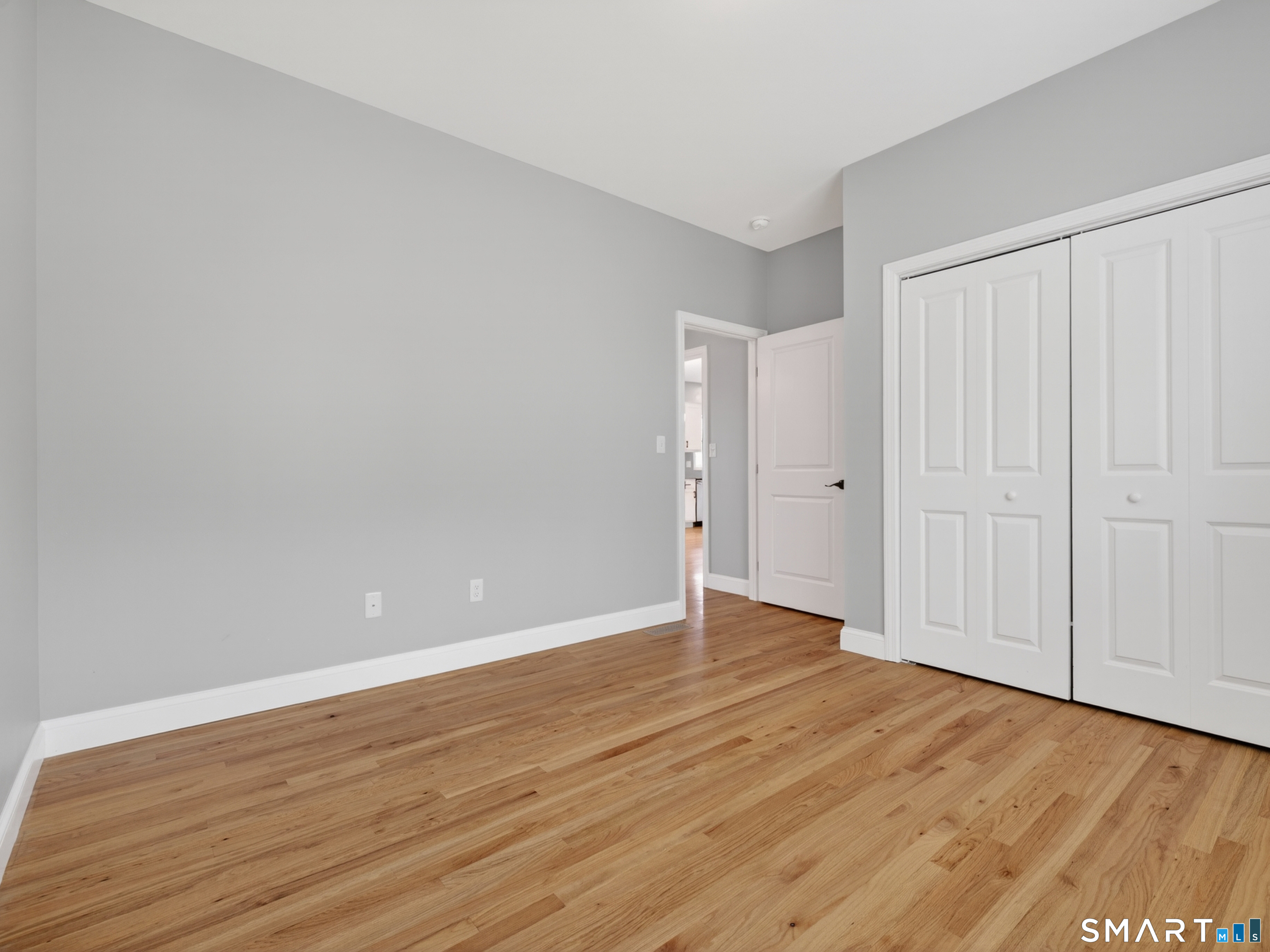 650 Ridgewood Road Middletown, CT 06457 - Photo 28 of 40 a view of an empty room with wooden floor