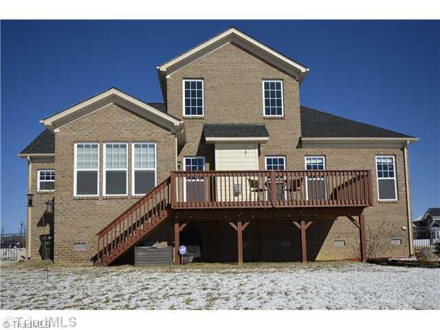 8509 Julina Drive Oak Ridge, NC 27310 - Photo 16 of 16 Exterior Back.