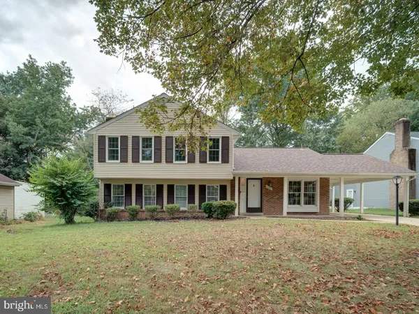 front view of a house with a garden