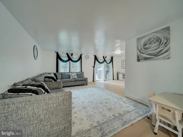 a bedroom with furniture and a bed