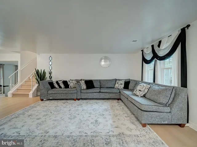 a living room with furniture and a couch