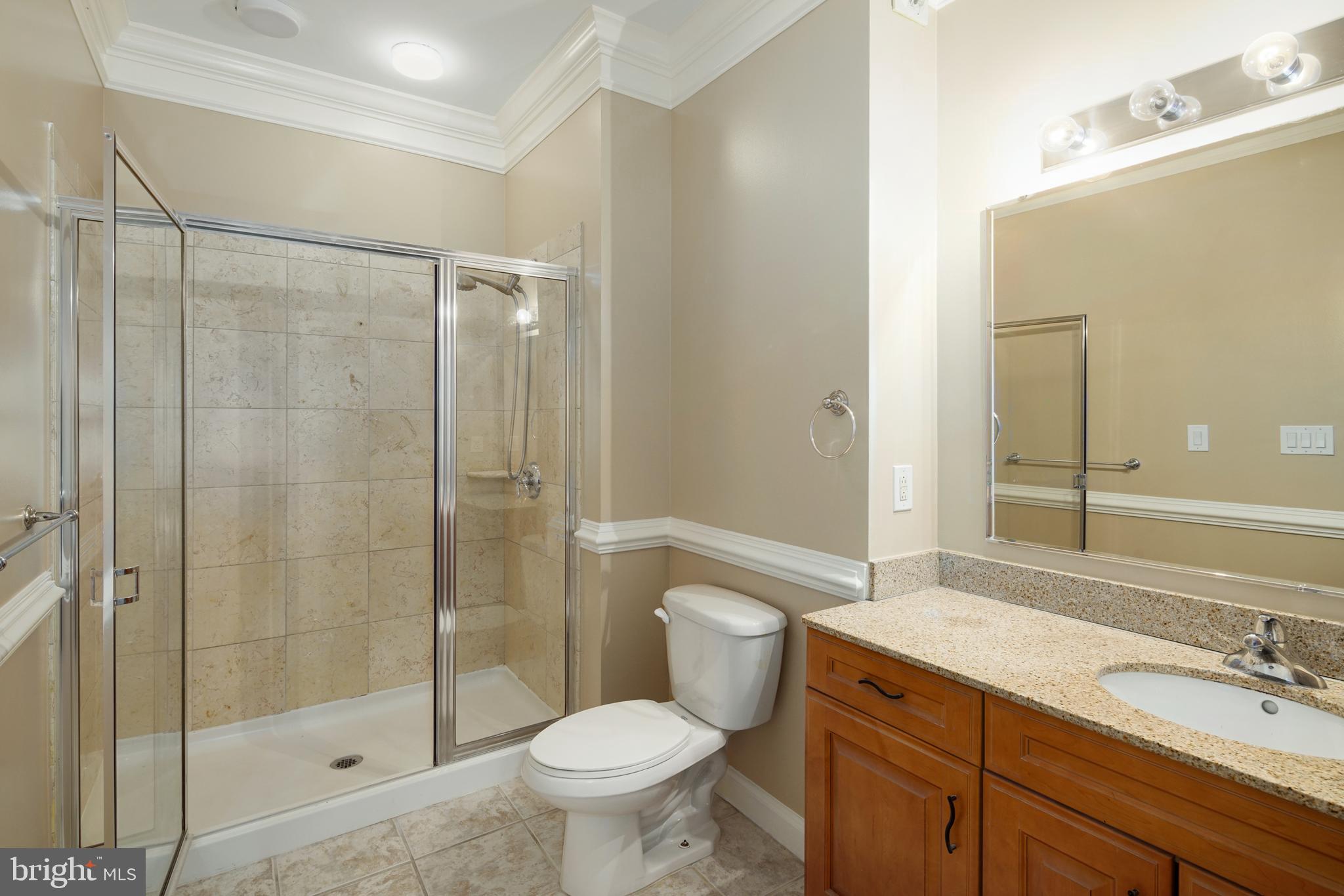 901 North Penn Street, Unit R1902 Philadelphia, PA 19123 - Photo 25 of 34 a bathroom with a sink toilet and shower