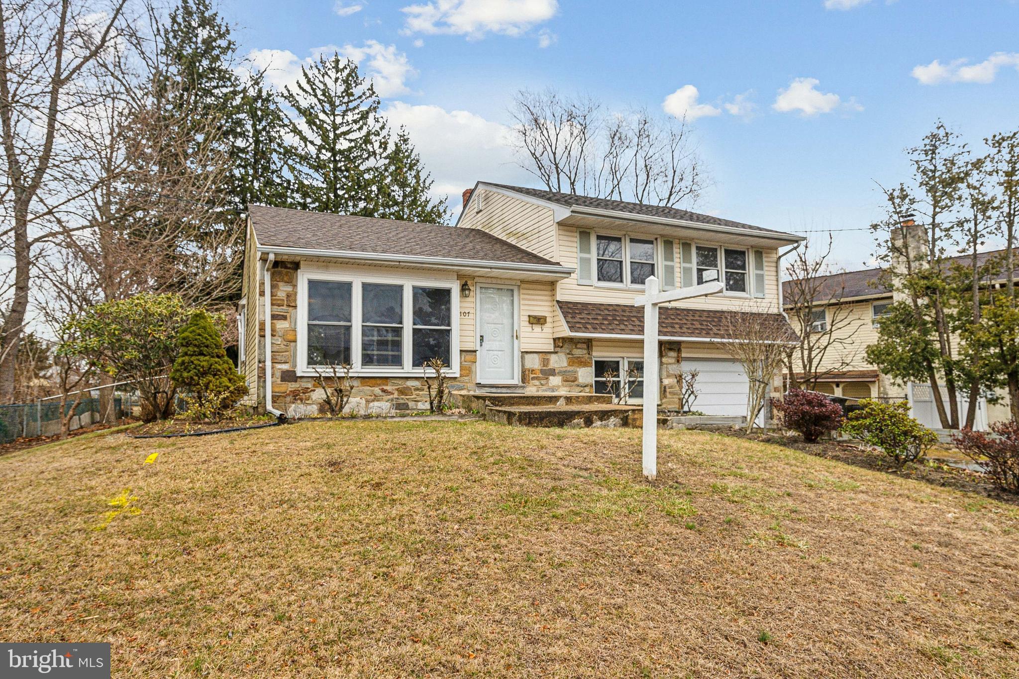 107 Surrey Road Voorhees, NJ 08043 - Photo 3 of 25 front view of a house with a porch