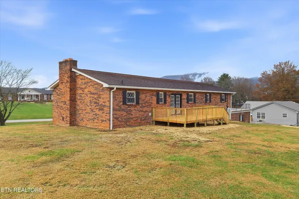 a view of a house with a big yard