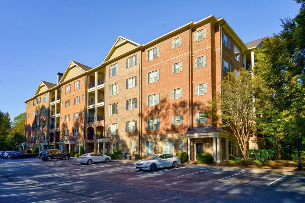 2300 Peachford Road, Unit 1205 Dunwoody, GA 30338 - Photo 1 of 1 a view of a building with a street
