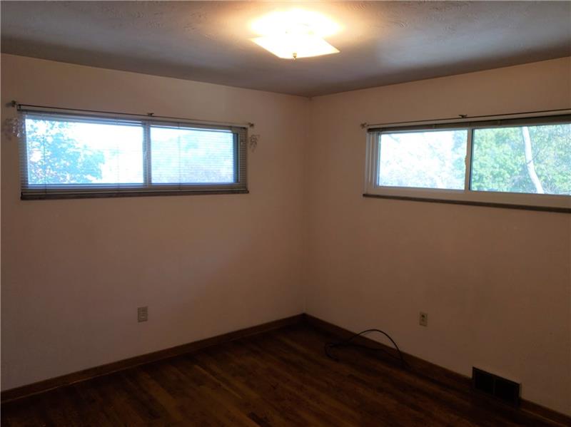 144 Jacks Run Road Pittsburgh, PA 15214 - Photo 11 of 21 2nd bedroom with hardwood floors
