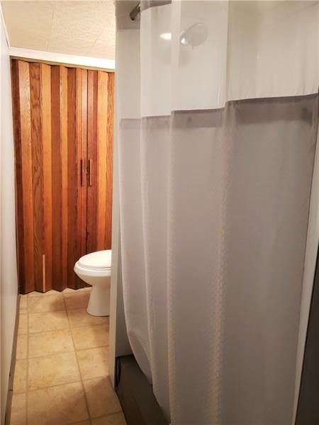 144 Jacks Run Road Pittsburgh, PA 15214 - Photo 15 of 21 continuation of lower level full bath offering large stand-up shower