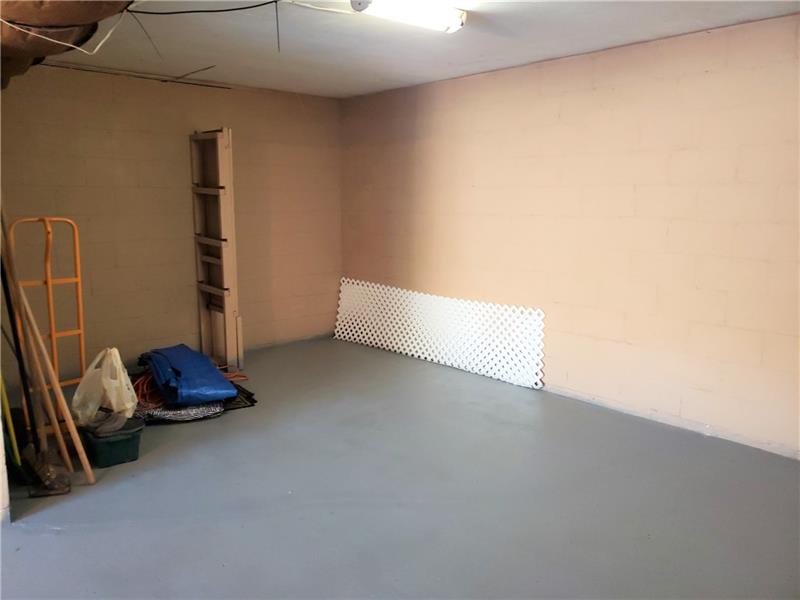 144 Jacks Run Road Pittsburgh, PA 15214 - Photo 20 of 21 integral garage has extra space in the back for storage or shelving