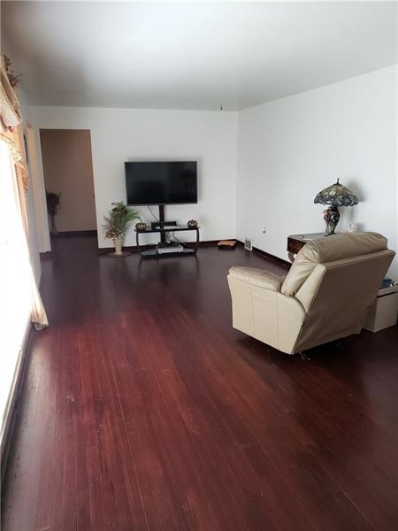 144 Jacks Run Road Pittsburgh, PA 15214 - Photo 3 of 21 Living Room is bright and sunny with large windows