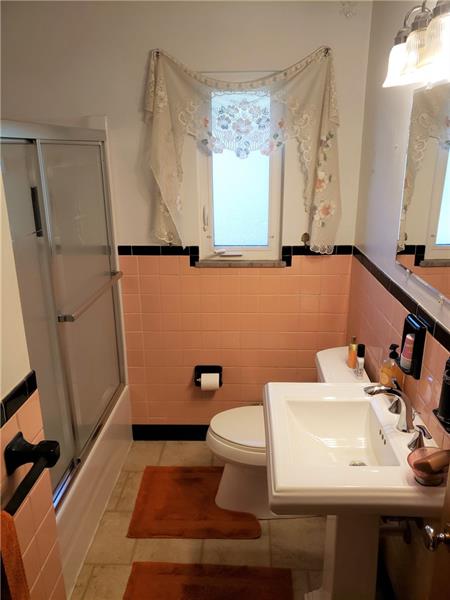 144 Jacks Run Road Pittsburgh, PA 15214 - Photo 8 of 21 main floor full bath had new tub, toilet, and sink installed in 2016