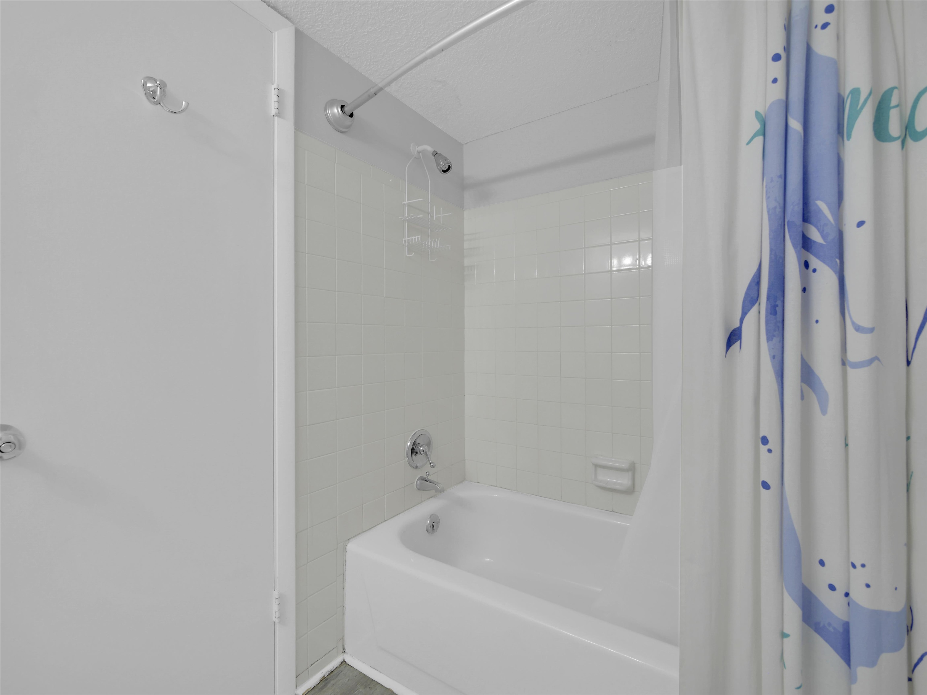 2 Dondanville Road, Unit 211 St. Augustine, FL 32080 - Photo 26 of 30 a bathroom with a bathtub and a shower