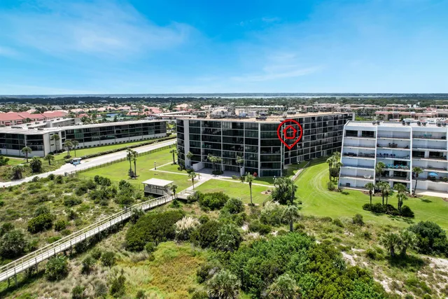 a view of a swimming pool with seating area
