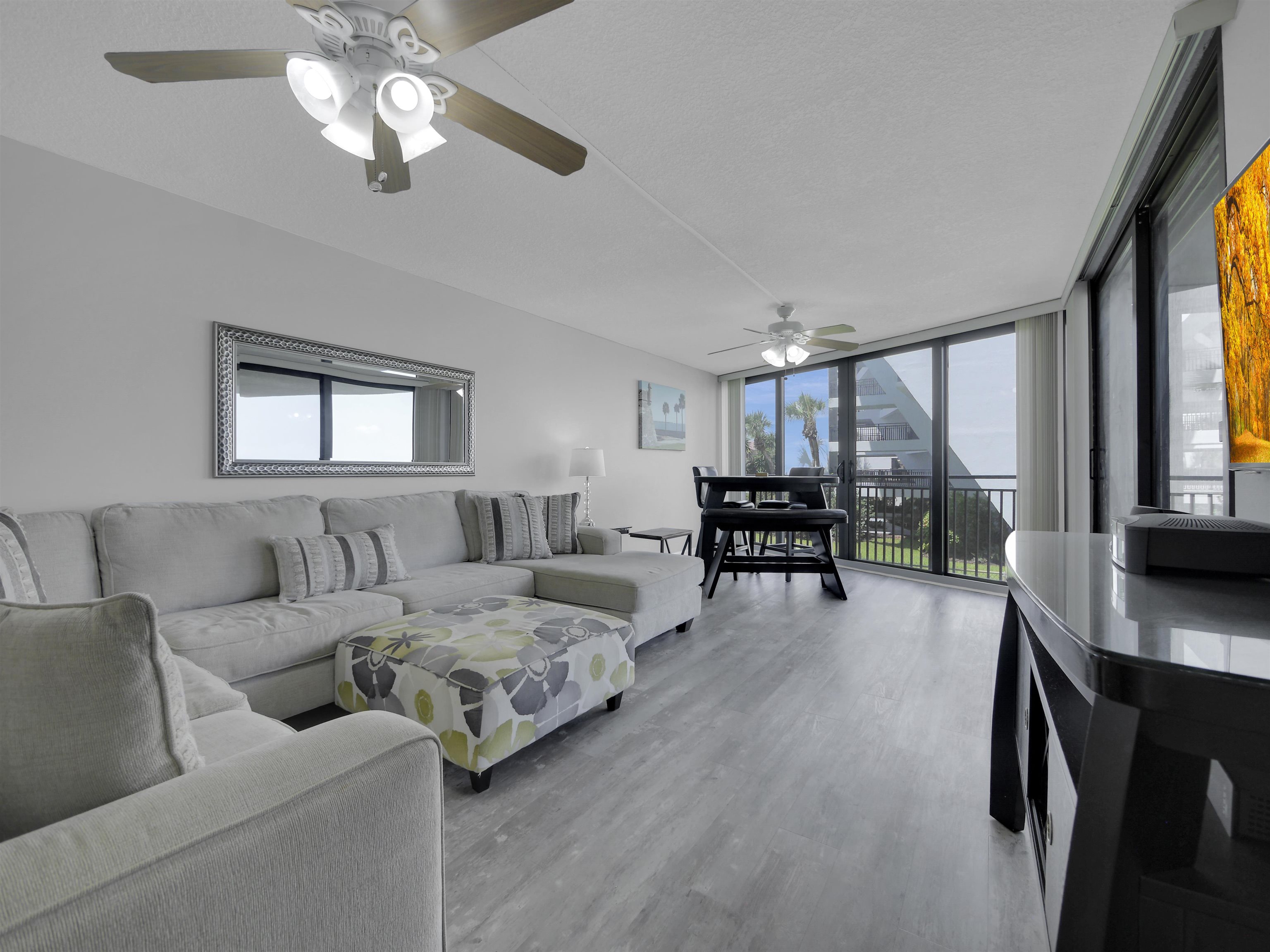 2 Dondanville Road, Unit 211 St. Augustine, FL 32080 - Photo 5 of 30 a living room with furniture and a large window