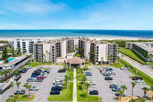 a view of swimming pool from a balcony